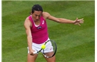 BIRMINGHAM, ENGLAND - JUNE 11: Francesca Schiavone of Italy in action against Sloane Stephens of the USA during day three of the Aegon Classic at the Edgbaston Priory Club on June 11, 2014 in Birmingham, England. (Photo by Paul Thomas/Getty Images)